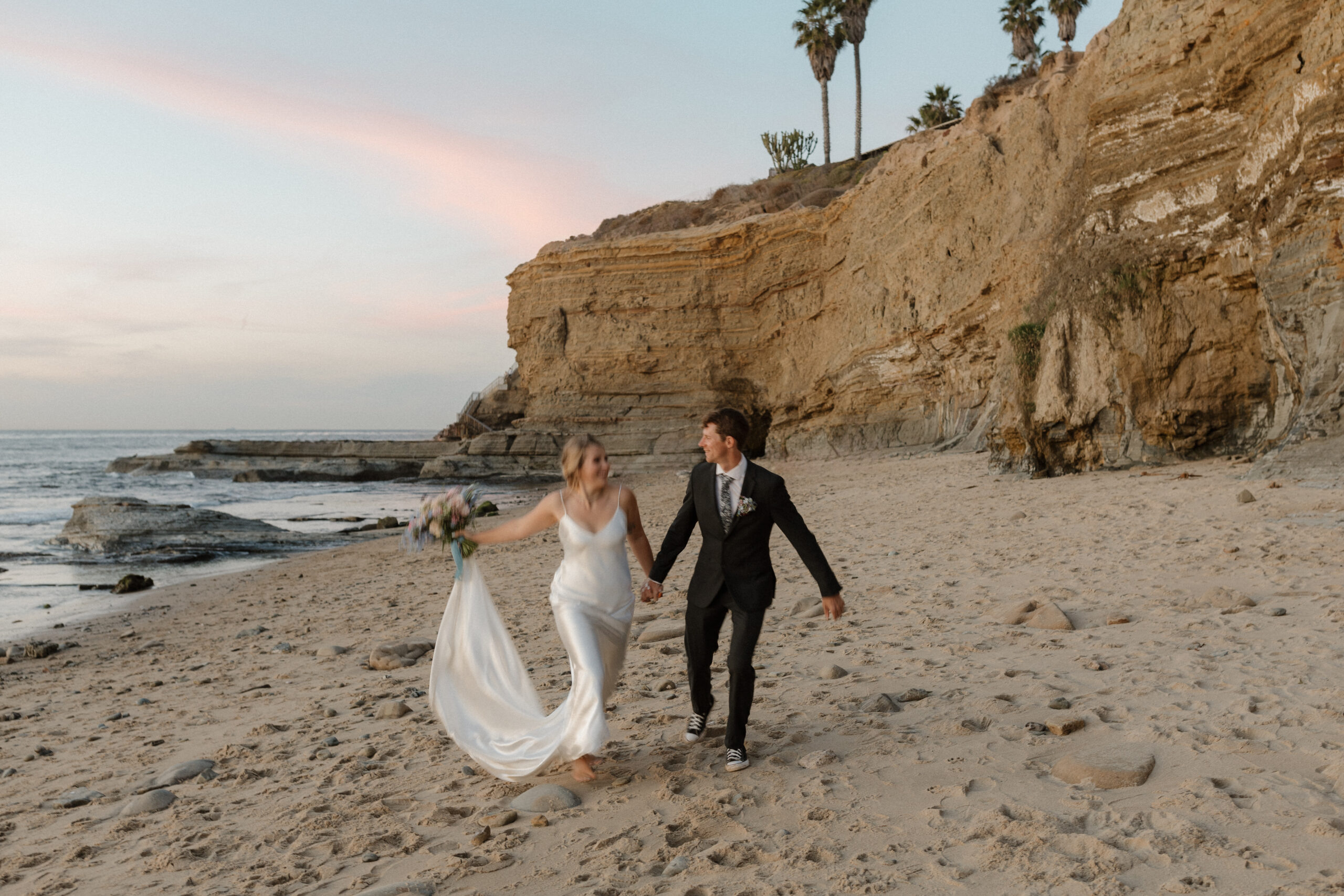 Blurry photo of couple running on the beach