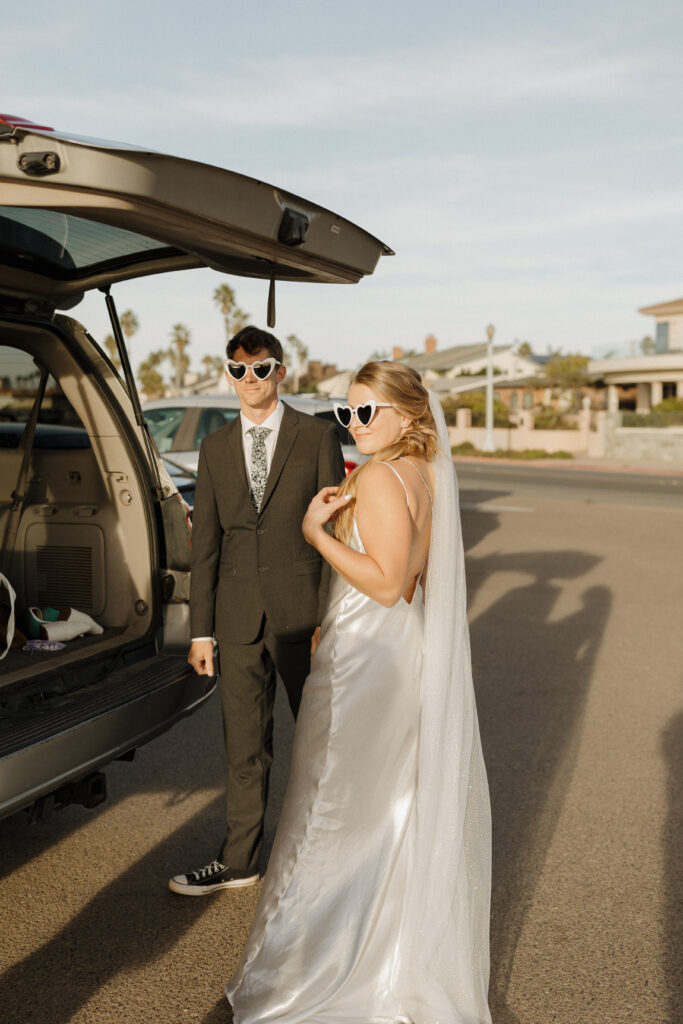 Couple wearing heart shaped glasses