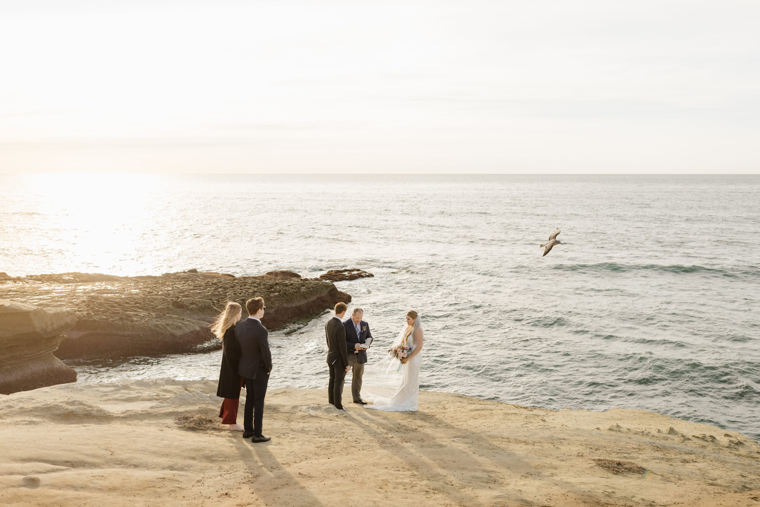 Wedding ceremony on sunset cliffs 