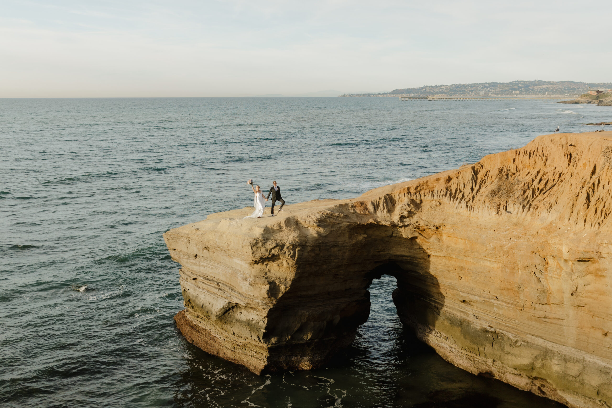 Elopement couple on the cliffside in san diego