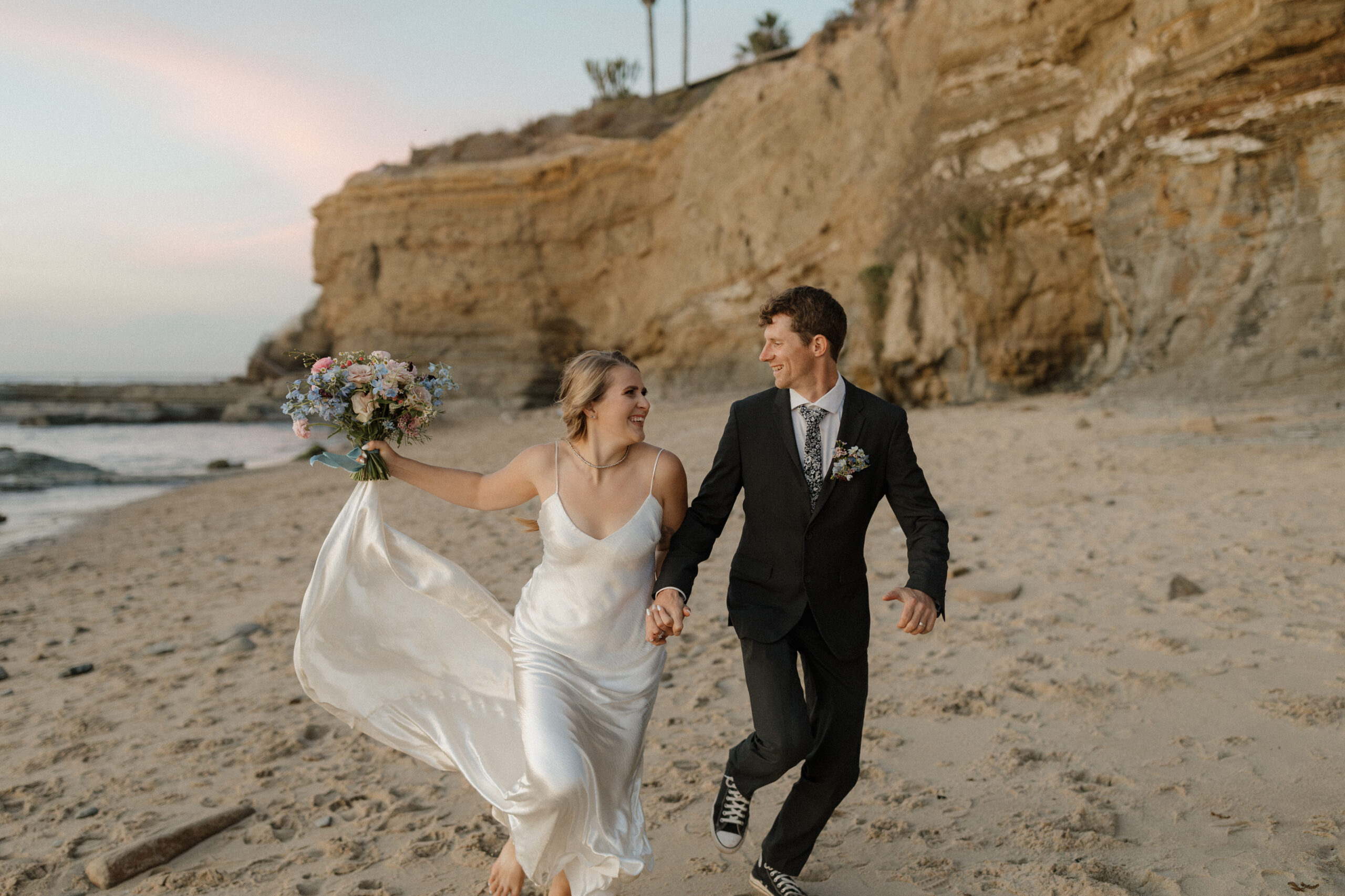 Couple running on the beach