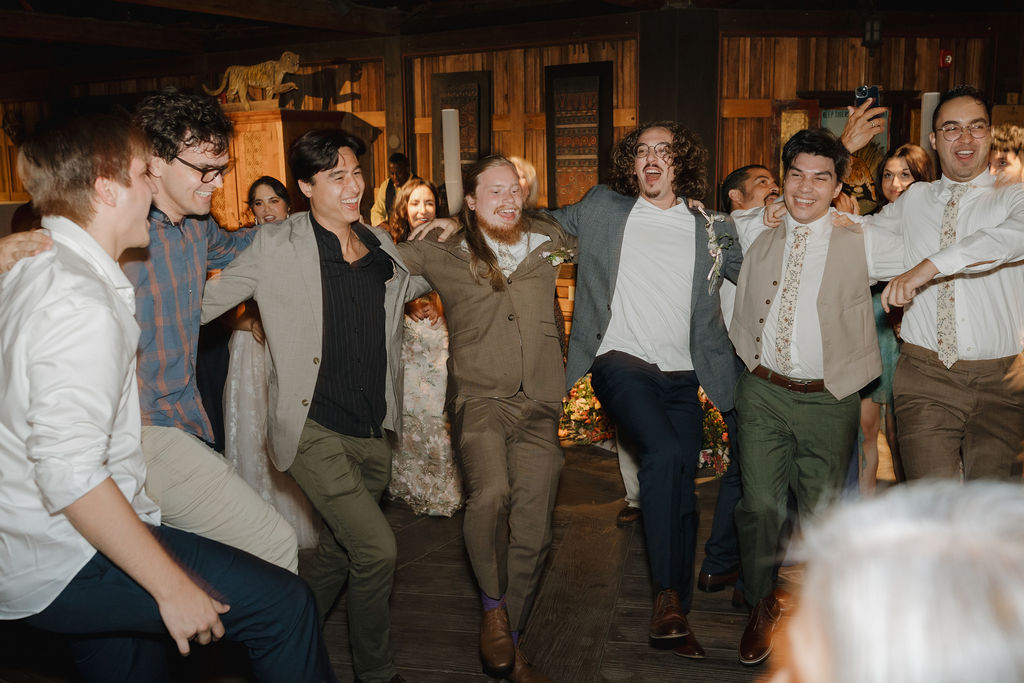 Guests dancing at a wedding in the Sambutan Longhouse. 