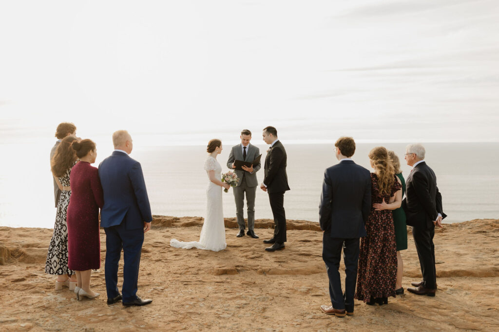 Newlyweds are photographed overlooking the Pacific at their cabrillo national monument wedding