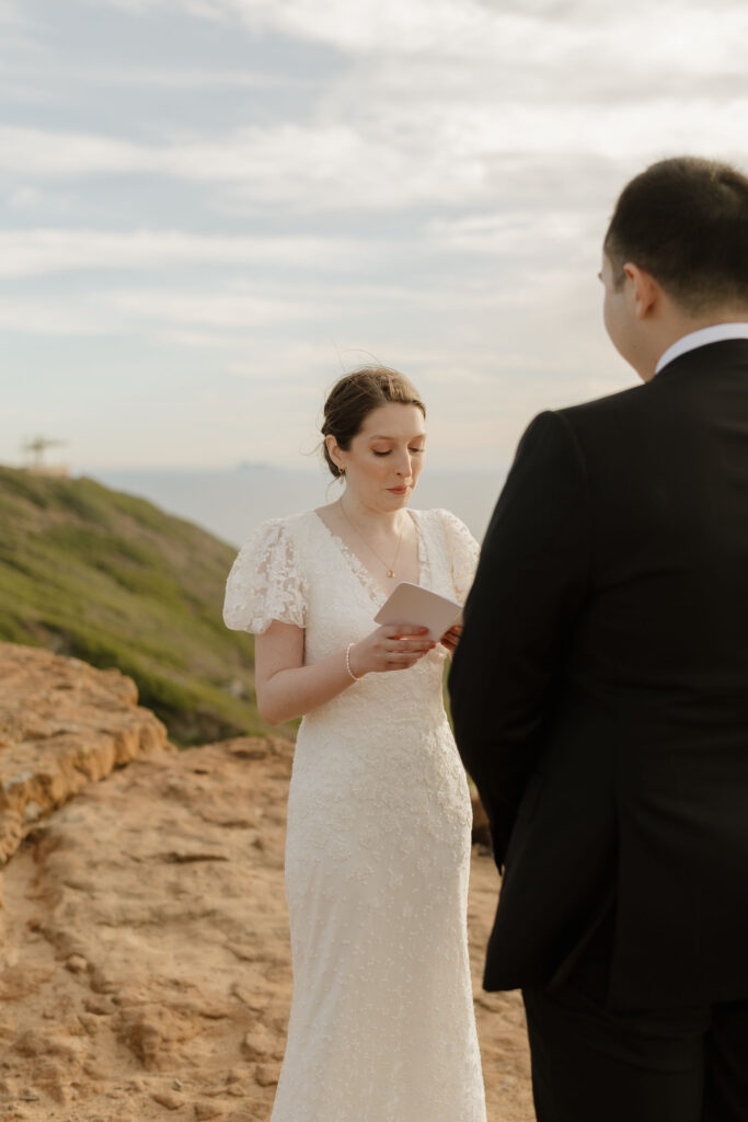 Couple exchanging vows at Cabrillo National Monument wedding