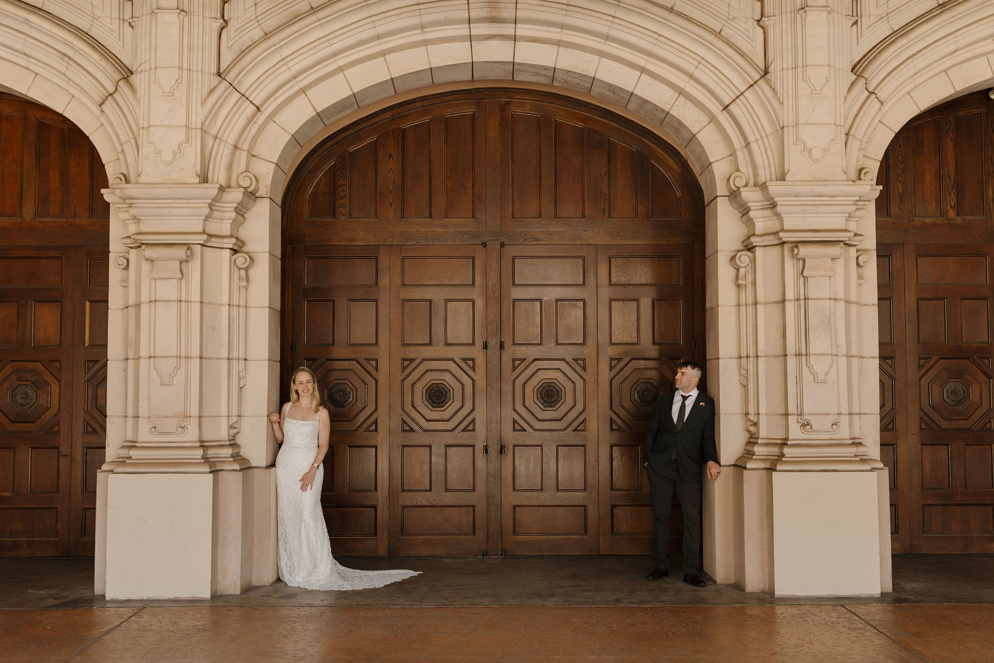 Balboa park elopement couple posing with the architecture