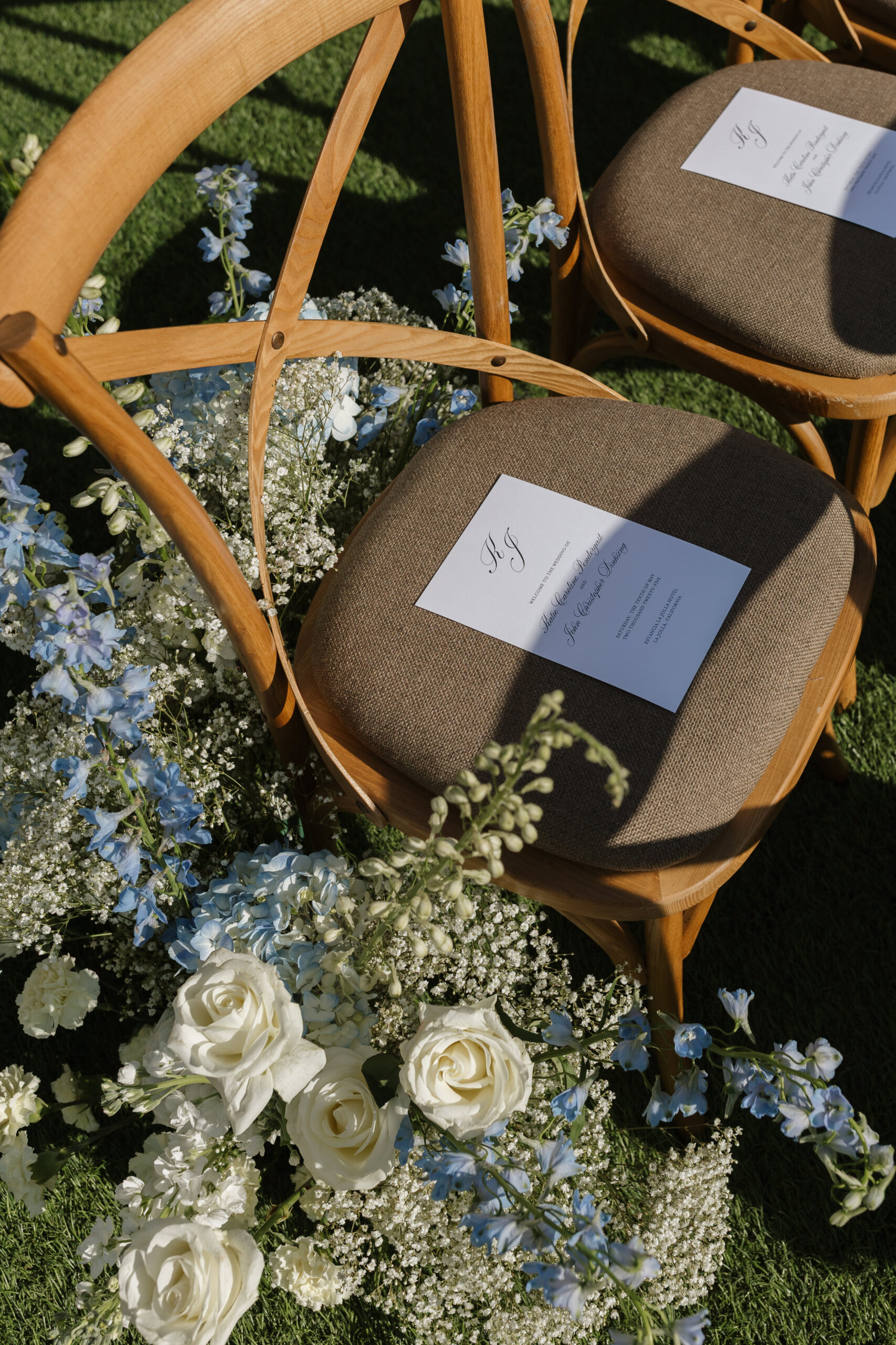 Wedding schedule on a chair with flowers