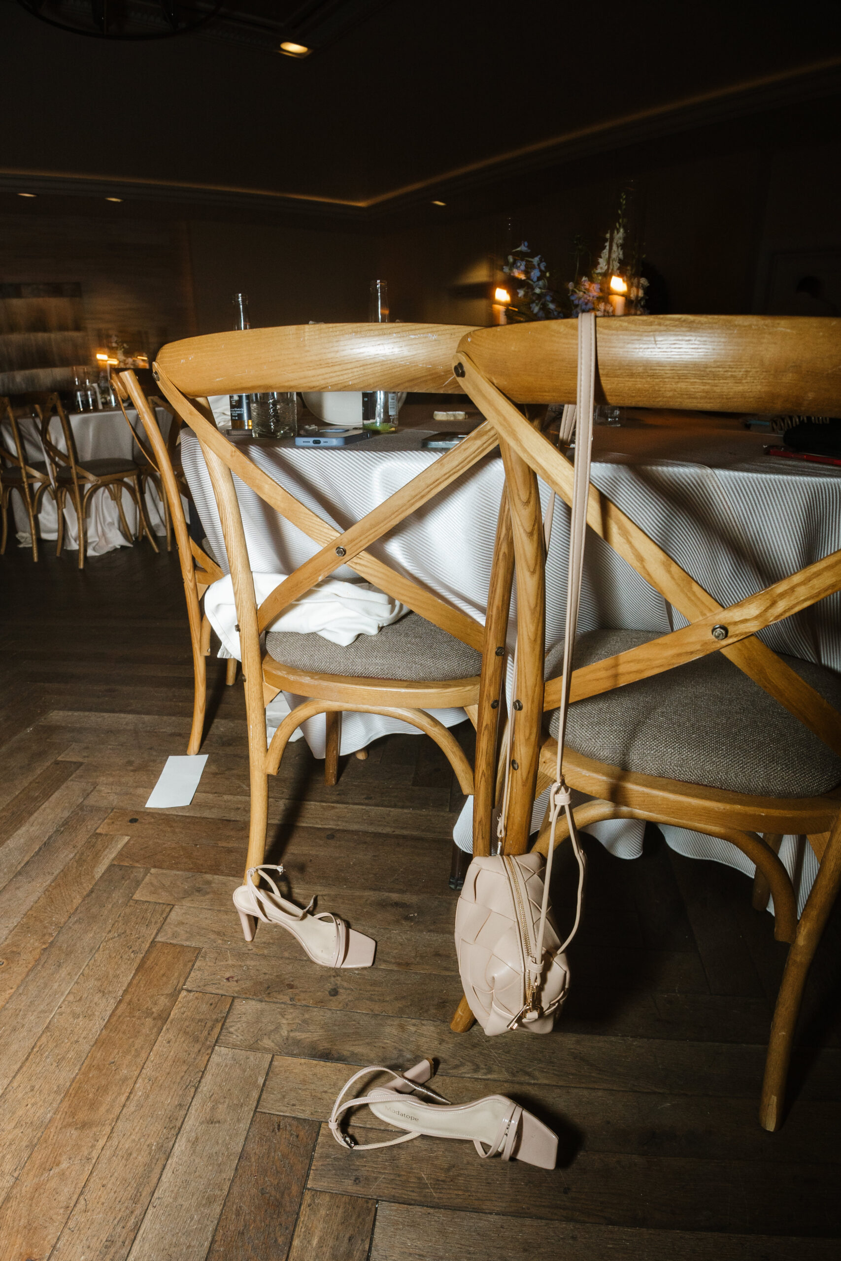 Wedding guests shoes on the floor at the reception
